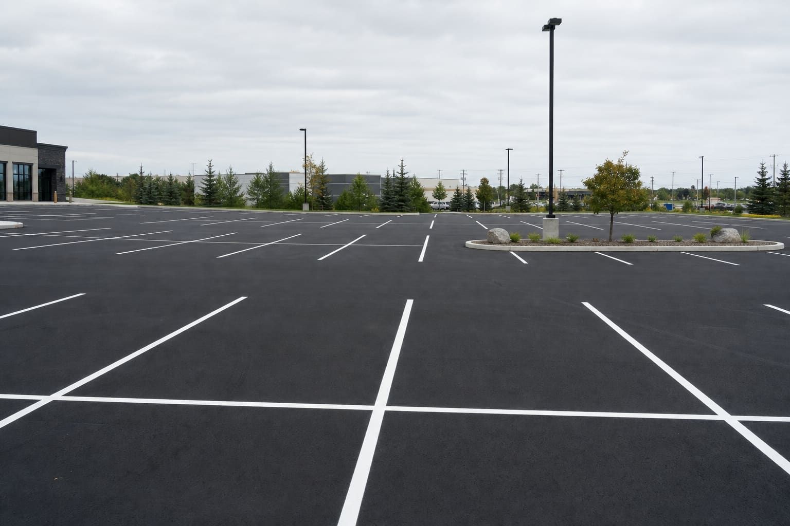 Commercial asphalt parking lot with crisp line painting